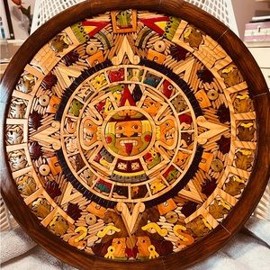 Hand carved, hand painted Mayan wooden Aztec calendar. Hand crafted in Mexico.